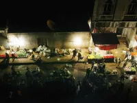 Night owls' late shopping: People are active at night and the markets operate later hours
to suit the consumers' schedules and activity, much like late night Christmas shopping. This hubbub marks the slight reversal of day
to night for the community who become more active after the break of fast.

