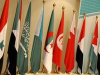 Arab country flags are displayed.