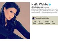 @HaifaWehbe: This diva pop-act is also taking the online Twitterworld by storm, boosting her fanbase in a numbers game not so different to record sales. An active 'Tweep' with nearly 3,000 tweets in just months, she is even more regular at changing her 'avatar' (profile pic). She engages with followers, even name-called one teenager a 'monkey'.


