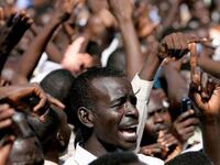 A Sudanese student shouts slogans during a protest against the visit of Darfur mediators from Qatar and the UN outside the University of Zalingei.
