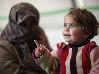baby refugee camp (UNHCR/ B. Sokol)