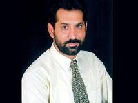 Aref al-Taweel is pro Syria's new constitution.