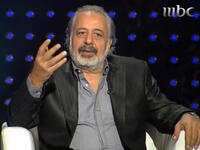 Ayman Zhidan: He described the Assad speech in parliament as akin to a celebration: "Today is a National Wedding";  and he thanked Assad for the immediate reforms he’d pledged.