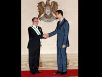 Durid Laham: a Face Book page described him as "horn of the regime". He used to act in theater plays that were critical of the regime; while now he supports Al-Assad. Some suspect he doesn't know which side his bread is buttered- that Laham demands reform and supports the regime at the same time.