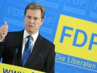 German Foreign Minister and vice-chancellor Guido Westerwelle gives a press conference to comment on WikiLeaks release of US diplomatic cables on November 29, 2010 in Berlin.