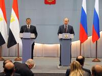 Morsi with Putin in Russia