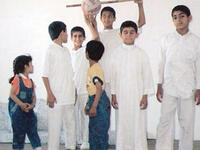 Najwa Ghanem: Original wife and 1st cousin of ‘tyrant’ in her own words, and mother to 11/14 children, she admits candidly that he wanted many sons in order to propagate Islamic warriors, training those sons be suicide bombers. Of Syrian extract, she lives in Damascus with son Abdullah.