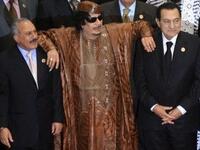 Needing his fellow Arab leaders to prop him up: Qaddafi using Ali Abdullah Saleh and Mubarak as crutches.  But now that they're falling, if not fallen, we doubt they can keep him standing.