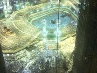 "Would you like a room view of Ka'aba, Sir?": With many rooms directly 'facing' the Ka'aba, the cubical building housing
the black stone towards which over a billion Muslims turn in prayer, the Abraj al-Bait village can charge extortionate prices that the 
majority of pilgrims cannot dream of. A one-room studio apartment starts at $650,000.
