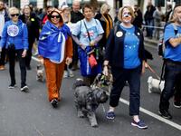 Dog owners and their pets participating in "People's Vote on Brexit", in central London. (Tolga AKMEN / AFP)