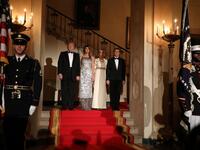 US President Donald Trump and First Lady Melania Trump stand with French President Emmanuel Macron and his wife, Brigitte Macron at the start of a State Dinner in the White House in Washington, DC, April 24, 2018. 
ludovic MARIN / AFP