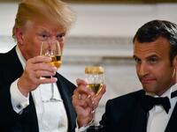 US President Donald Trump (L) and French President Emmanuel Macron (R) toast during a State Dinner in honor of Macron at the White House in Washington, DC, April 24, 2018. 
ludovic MARIN / AFP
