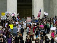 Demonstrators take the steps of the US Supreme Court to protest against the appointment of Supreme Court nominee Brett Kavanaugh in Washington DC, on October 6, 2018. (Jose Luis Magana / AFP)

