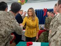 US First Lady Melania Trump greet members of the US military during an unannounced trip to Al Asad Air Base in Iraq on December 26, 2018.
SAUL LOEB / AFP