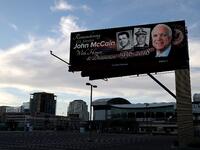 A message honoring U.S. Sen. John McCain (R-AZ) is displayed on a billboard on August 27, 2018 in Phoenix, Arizona. (AFP)