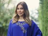 Yara posted a picture in a blue Abaya to send her wishes to her followers during the holy month