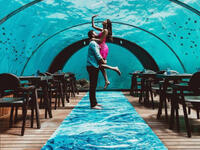 Taken in 5.8 Undersea, the deepest undersea restaurant while vacationing in sunny Maldives. Alice and Ali hit 