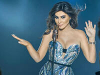 The new albums cover and booklet pictures seems to suit the albums songs mood