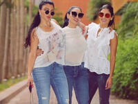 The Lebanese diva and her sisters sported casual looks with denim tight pants