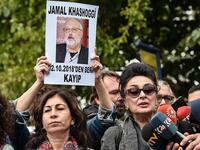 Vice president of the Turkish Human Rights Association (IHD) Eren Keskin (R) speaks to journalists during a demonstration in front of the Saudi Arabian consulate on Tuesday in Istanbul. (AFP/File)