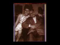 With Dad: Her father, Mohammad Hosny, was an Egyptian calligrapher.  She arose from humble origins and came with little in the way of finances or education. She was the 10th of 17 siblings, so had to learn the art of sharing, not to mention any other arts she pursued.