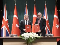 Britain's Prime Minister Keir Starmer (L) and Turkey's President Recep Tayyip Erdogan (R) pose after signing an agreement to sell 20 Eurofighter jets to Ankara in a 10-year deal worth nearly $11 billion at the Presidential Palace in Ankara on October 27, 2025. AFP Turkey signs €11 billion Eurofighter deal with UK