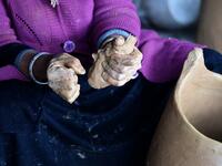 Sabiha Ayari, a Tunisian potter in her fifties, works in the village of Sejnane in the northern Tunisian province of Bizerte, about 120 kilometres (75 miles) west of the capital Tunis.  FETHI BELAID / AFP