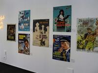 Vintage cinema posters are displayed at an art exhibition in the Lebanese capital Beirut  JOSEPH EID / AFP