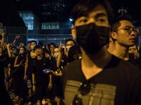 Protesters gather outside the government headquarters after a rally against a controversial extradition law proposal in Hong Kong  DALE DE LA REY / AFP