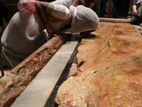 An Orthodox pilgrim kisses the anointment stone at the church of the Holy Sepulchre in Jerusalem's Old City, on April 25, 2019, during the Orthodox Holy Week.  GALI TIBBON / AFP