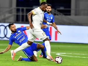 Al Nasr's Joan Oumari (left) tries to tackle Shabab Al Ahli's Ahmed Khalil on Friday. - Supplied photo