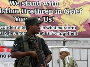 Security personnel stand guard outside a mosque during Friday noon prayer in Colombo on May 3, 2019, following a series of bomb blasts targeting churches and luxury hotels on Easter Sunday in Sri Lanka.