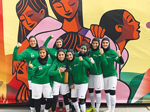 The Greens’ squad are using the plastic bottles they collected at the football stadium to create an art work that will highlight the harm plastic does to the planet. (Supplied photo)