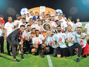 Dhofar players celebrating with the Omantel League trophy (Photo: Muscat Daily)