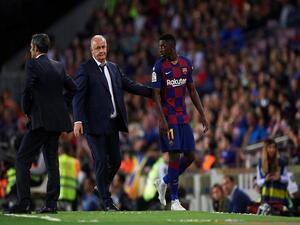 ديمبيلي (يمين) بعد طرده