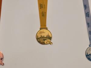 The medals of the championship, which carries the image of the most prominent tourist attractions in Dubai have been designed in Braille language to suit the participants of the people of determination.