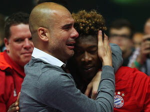 صورة أرشيفية لغوارديولا وديفيد آلابا