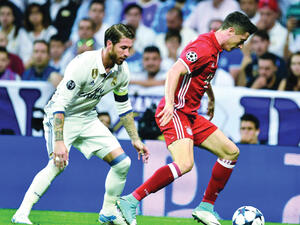 صورة أرشيفية لليفاندوفسكي وراموس