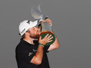 Shane Lowry with the cup he won in Abu Dhabi. (Supplied)