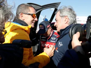 Bahrain JCW X-Raid Team's Carlos Sainz after winning the Dakar Rally alongside Yann Le Moenner, CEO of A.S.O.