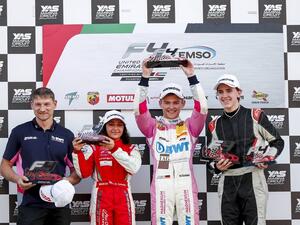 Hamda Al Qubaisi (second left) with Race 4 winner Nico Gohler and third-paced Lorenzo Fluxa pose with their trophies. - Supplied photo