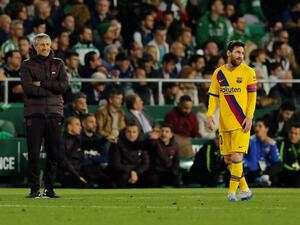 ليونيل ميسي (يمين)