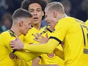 هالاند (يمين) وثورغان هازارد