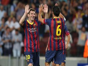 صورة أرشيفية لتشافي وميسي