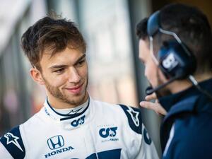 Pierre Gasly of France and Scuderia AlphaTauri talks to his mechanic during the filming day in Misano, Italy on Feb. 15, 2020 (Photo: SG)