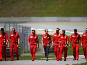 Ferrari's Sebastian Vettel walks the circuit with his team members at the Red Bull Ring in Spielberg, Austria, on Thursday. - Twitter