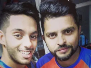 UAE opening batsman Chirag Suri with Suresh Raina. Suri was picked by Gujarat Lions in the 2017 IPL. (Supplied photo)