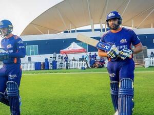 Mumbai Indians captain Rohit Sharma (right) goes out to bat during a practice match. (MI Twitter)