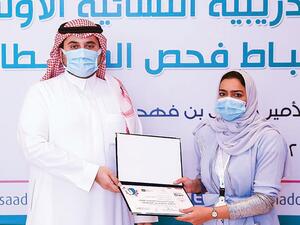 Prince Fahad bin Jalawi awarding doping control officer certificates to Saudi women after completion of their training course. (Supplied)