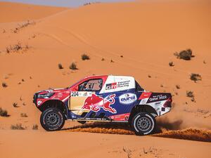 Carlos Sainz in a Mini JCW Buggy was declared winner of the Hail Baja 2 after the FIA stewards penalized Saleh Al-Attiyah for late speeding. (Supplied)
